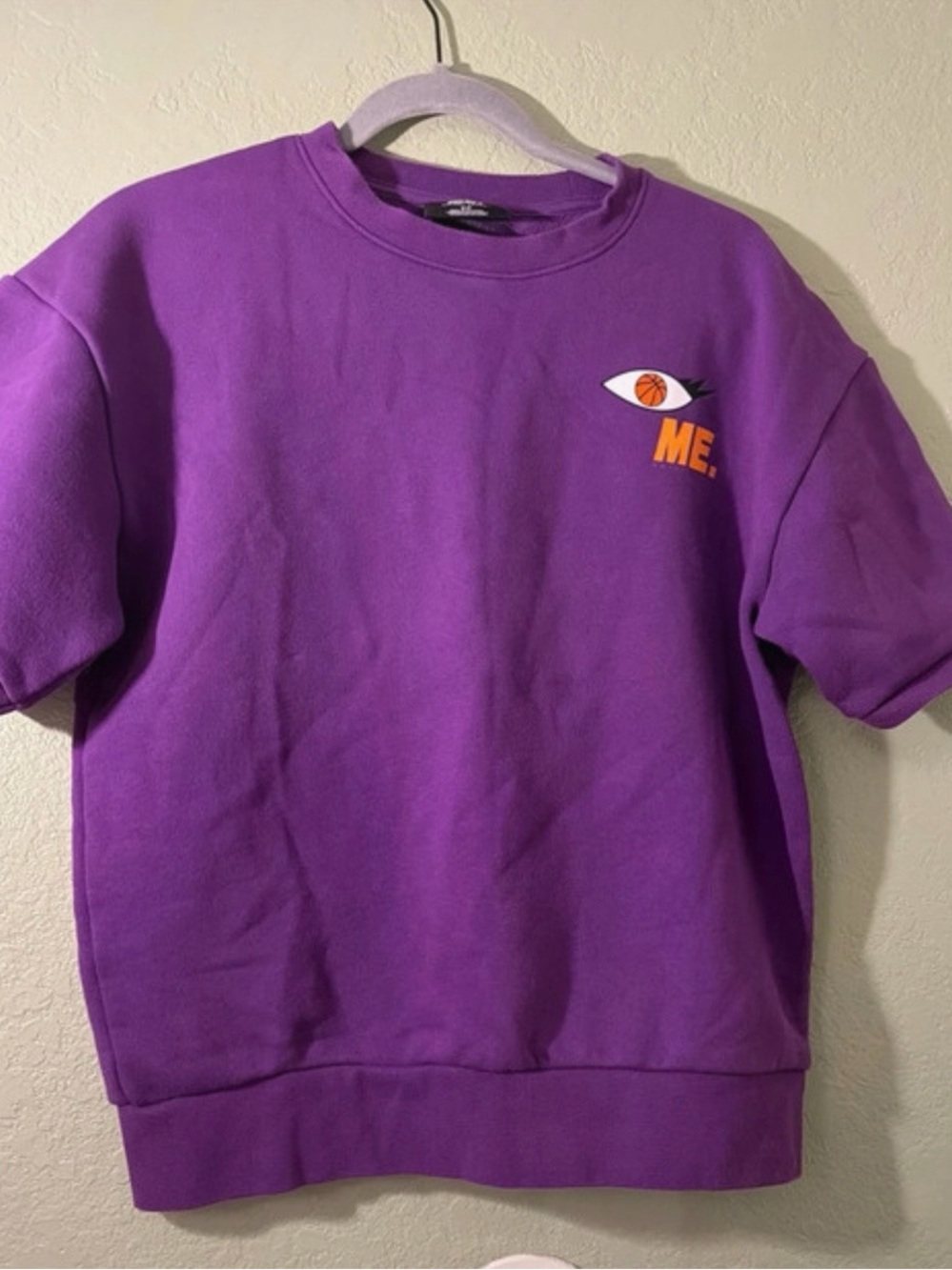 Melody Ehsani Purple Short-Sleeve Sweatshirt and shorts with ME. Eye Graphic